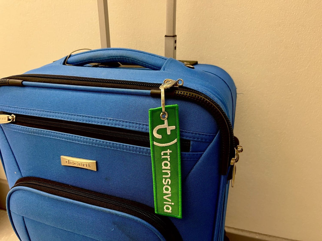 Twee vrolijke Transavia-sleutelhangers